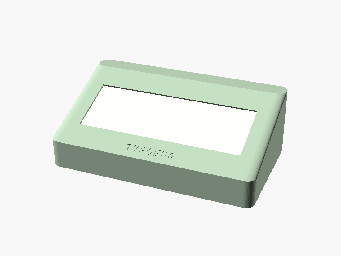 The deck: bezel lip framing the e-paper aperture, screen ghosted in