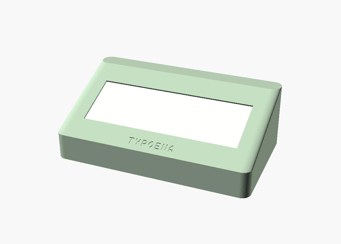 The deck: bezel lip framing the e-paper aperture, screen ghosted in